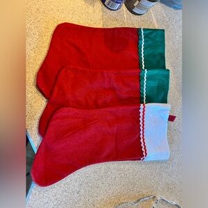 3 each felt Christmas stockings.